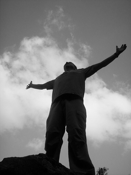 man-with-open-arms-looking-up-to-the-sky_black